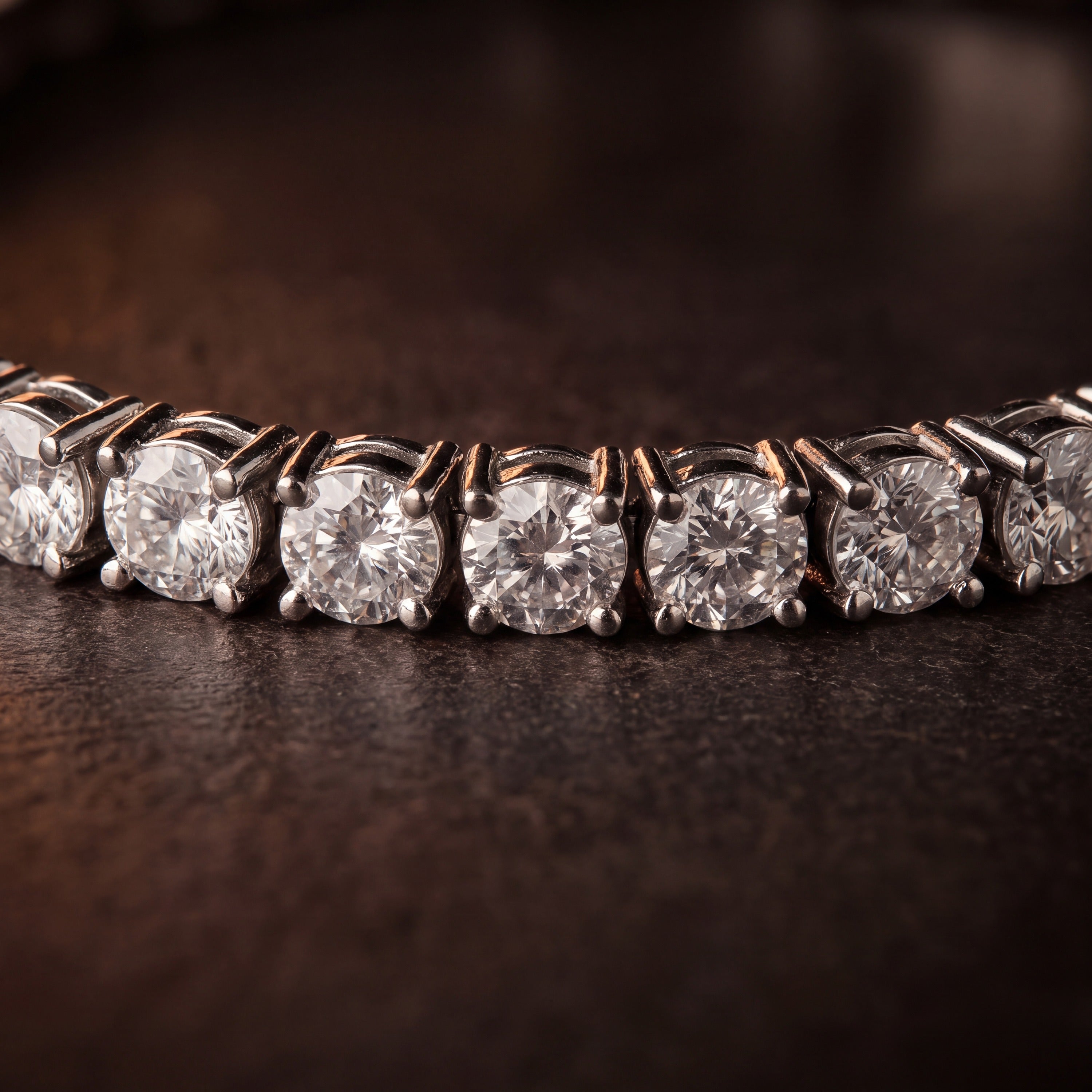 Close-up of the four-prong settings on a rhodium-plated cubic zirconia tennis bracelet